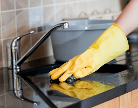 Local communal area cleaning team working in a SE16 building