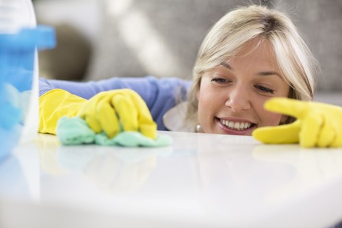 Cleaning team handling a move-out clean in a SE16 residential block